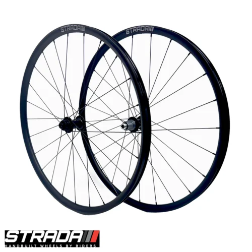 An Image showing a front side view of a pair of Strada Gravel Alloy Plus 650b bicycle wheels in black.