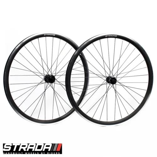 An image of a pair of Strada Big Fella rim brake front and rear road bicycle wheels in black fitted on a Miche Primato hubs