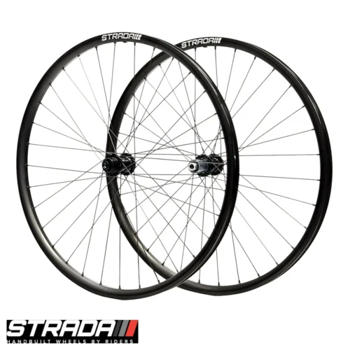 An Image showing a pair of black aluminium Strada Big Fella Gravel bicycle wheels.